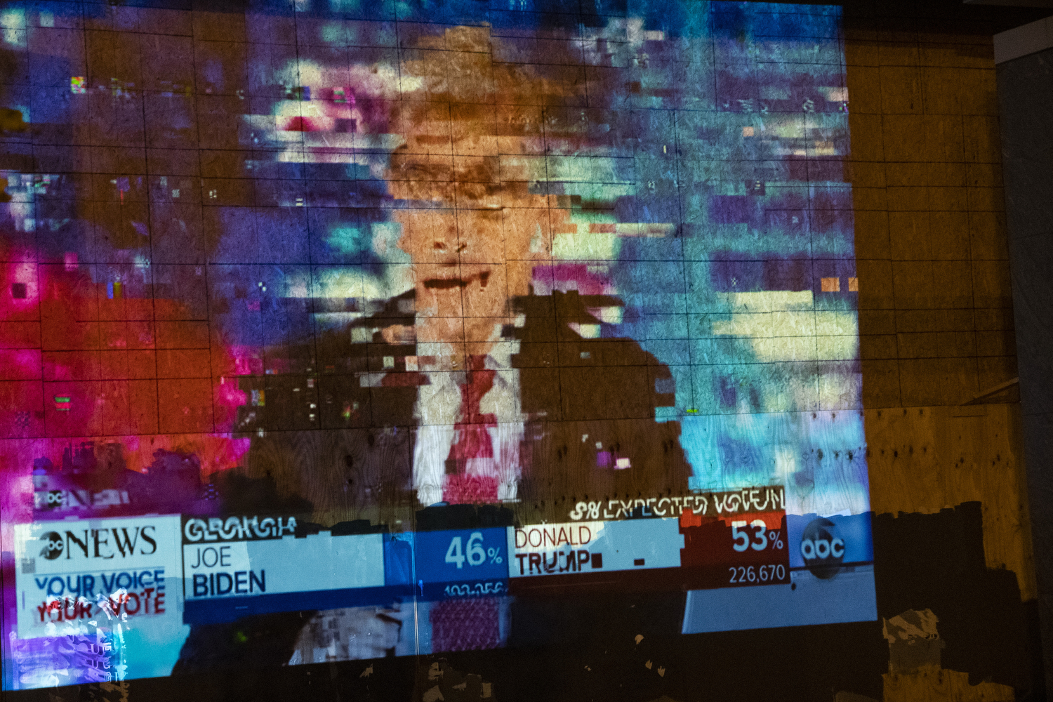 The election results stream in Black Lives Matter Plaza on election night glitches. 