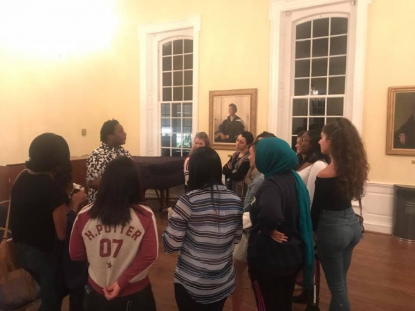 Group of people discussing in a circle