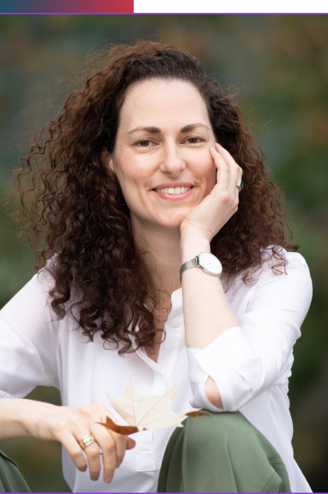 Woman sitting and smiling