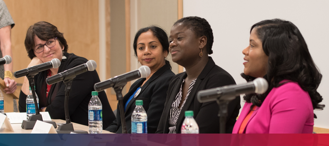 women speaking at a panel