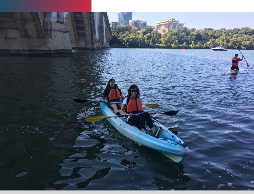 two women in a kayak on the Potomac