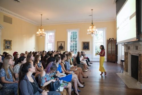 Yeganeh Salahi speaking in front of audience