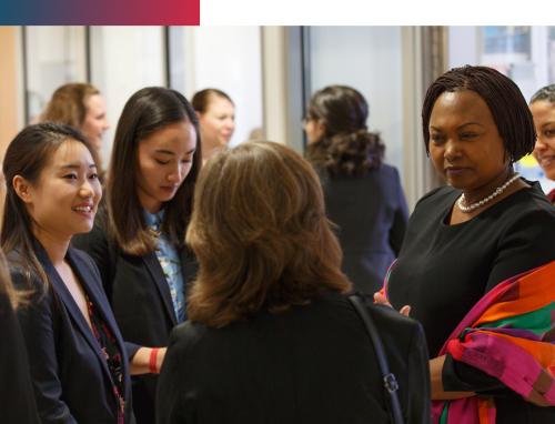 Students talking to speaker