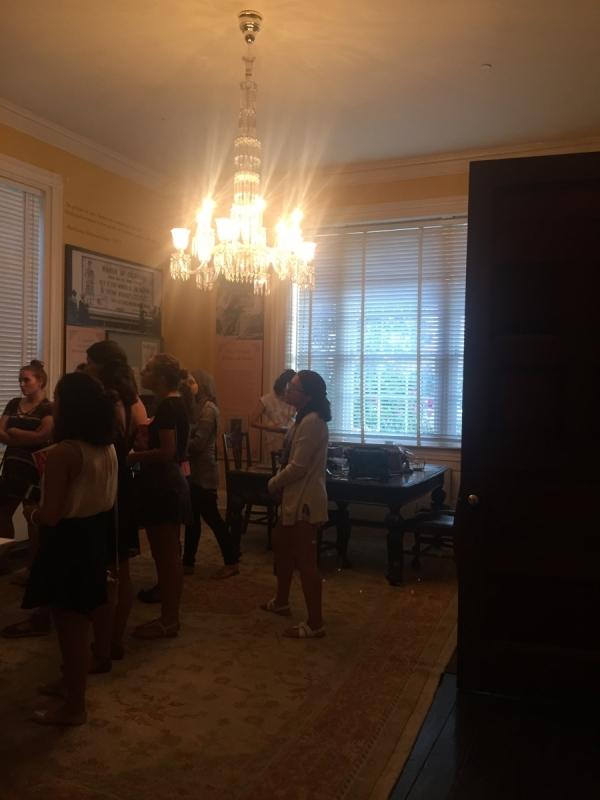 people watching someone in a room